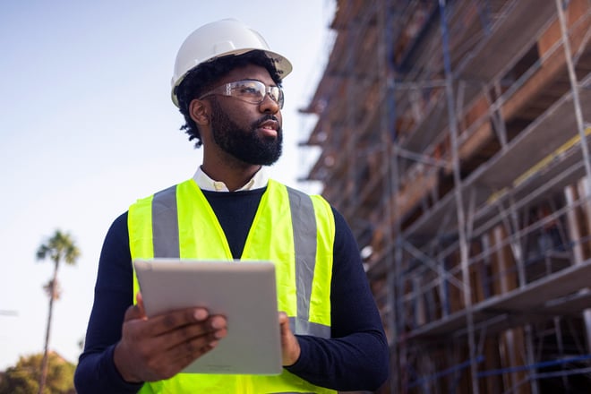 A project manager at a residential construction site.