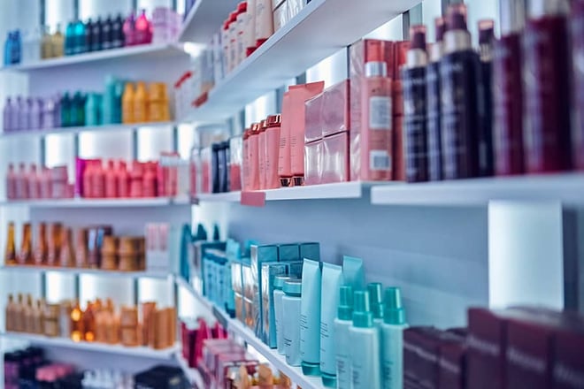 Shelves of products inside a beauty retailer.