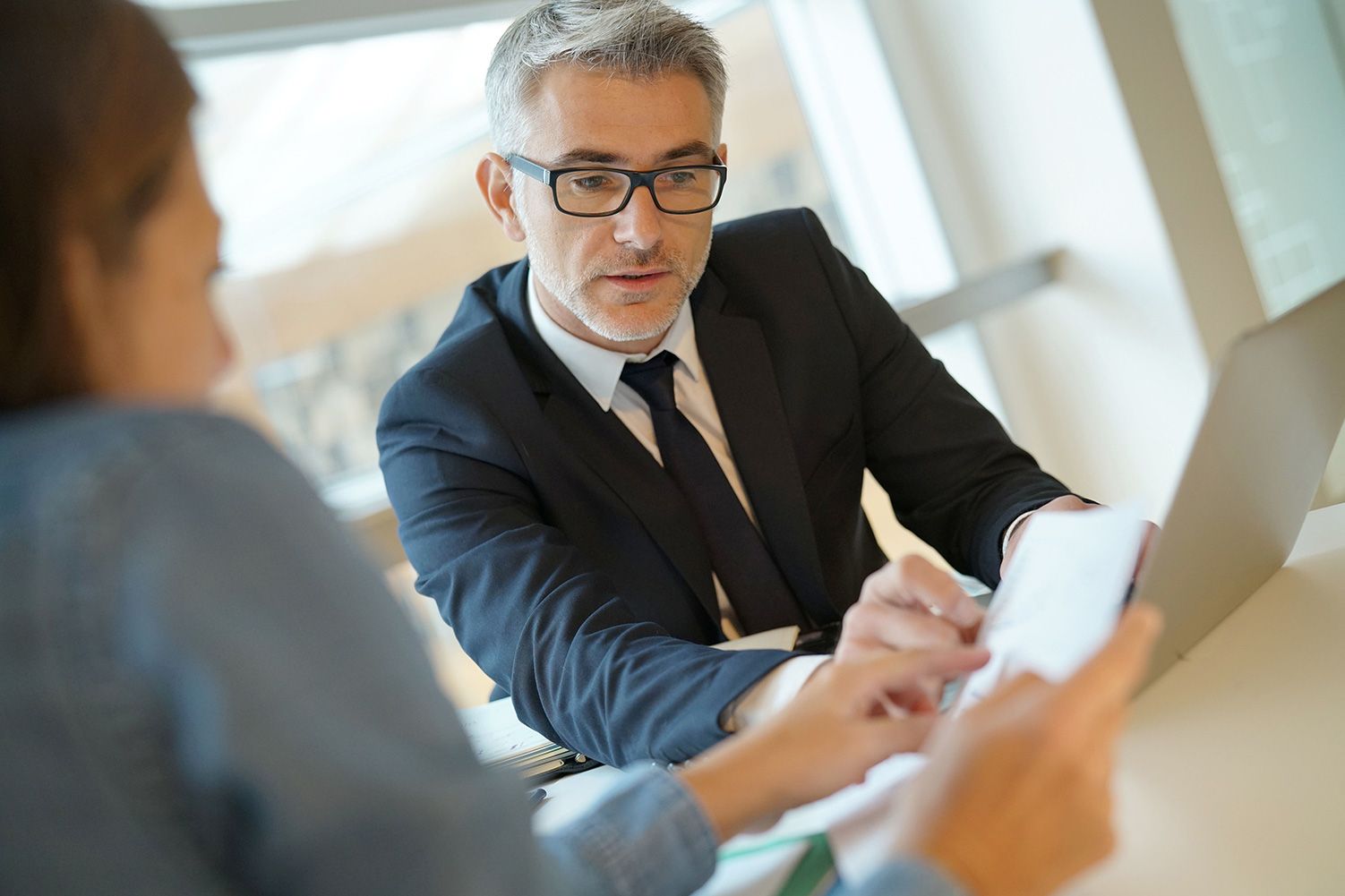 man reviewing paperwork