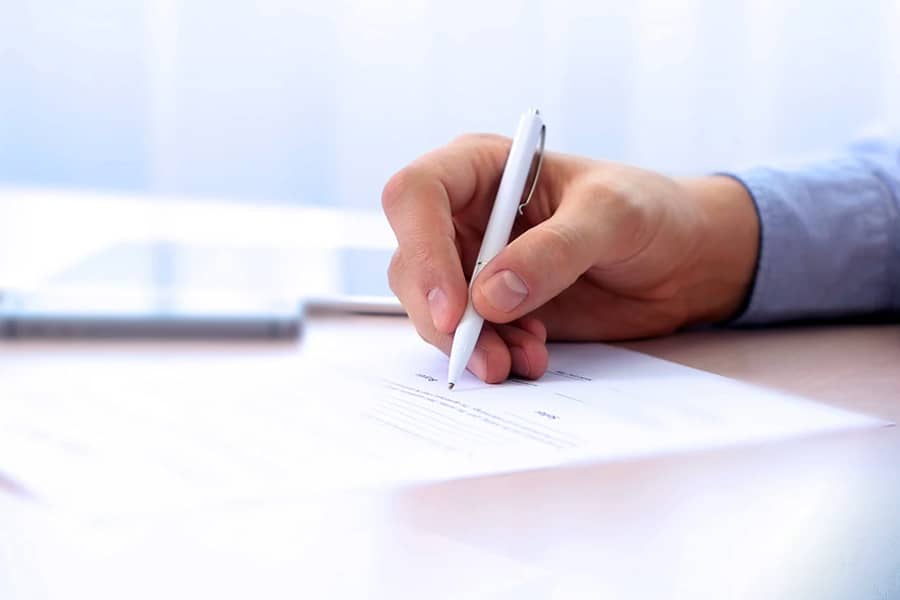 Businessman signing