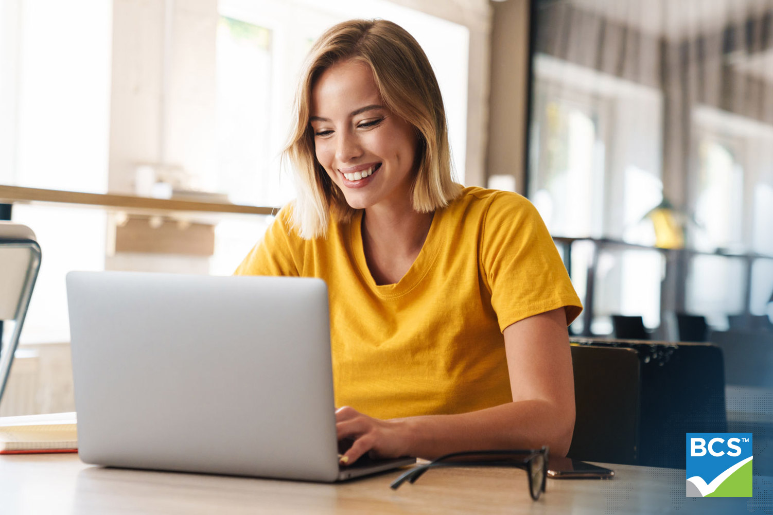 woman using laptop at the office