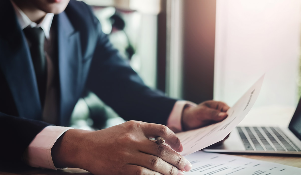 businessman-looking-at-papers